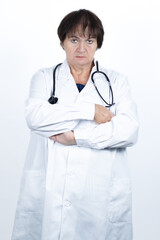 Female doctor expressing disapproval crossing her arms seriously