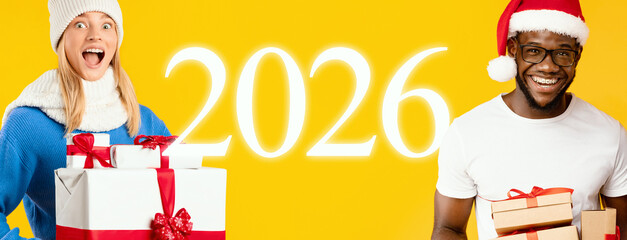 Two cheerful individuals are surrounded by colorful gifts during a festive occasion. They wear warm clothing and festive accessories, creating a joyful atmosphere.