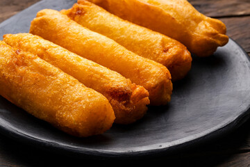 Carimañola, fried cassava dough balls filled with cheese or meat