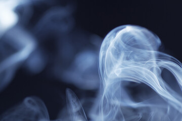 Macro shot of smoke produce from cigarette © taffpixture