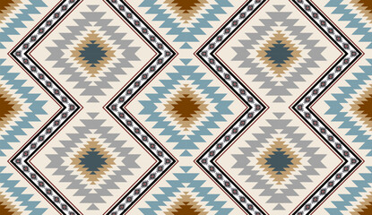Seamless geometric ethnic pattern inspired by Native American tribal fabric. Traditional Aztec and Navajo style carpet and tile vector design on navy blue background. Perfect for textile, wrapping,