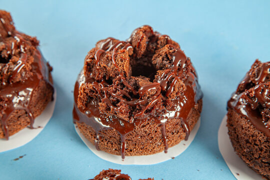 Chocolate cake brioche doughnuts gourmet hand made closeup.