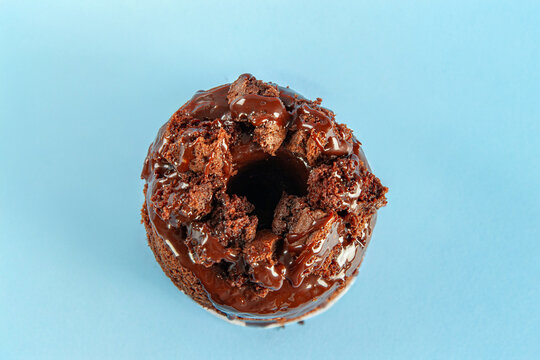 Chocolate cake brioche doughnuts gourmet hand made closeup top view.