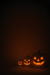 Spooky Halloween pumpkins glowing mysteriously in the dark, ready for trick or treat fun and spooky season celebrations, a perfect festive decoration