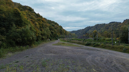 road in the mountains with cloudes