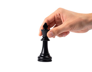 Close-up of a hand using a precision grip to lift or place a black chess King piece by its cross top, showing a strategic move, isolated against a light gray background.