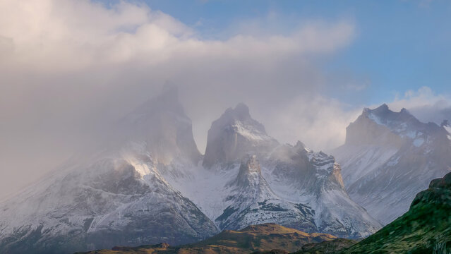 early morning shot clip of cuernos del paine on a stormy autumn day