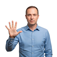 Fototapeta premium Serious Caucasian man in a blue shirt holding up his right hand with five fingers extended, looking directly at the viewer in a studio.