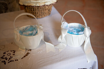 Elegant wedding church decorations with flowers, candles, and ribbons for ceremony