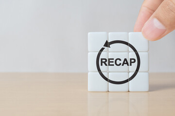 Recap economy, business, financial concept. For business planning. RECAP word icon on dice on smart grey background and copy space