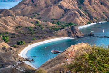 Scenic aerial shot of Komodo National Park from Padar Island during golden sunrise