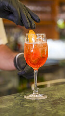 Refreshing Aperol Spritz cocktail served with ice and orange slice for a delicious aperitivo
