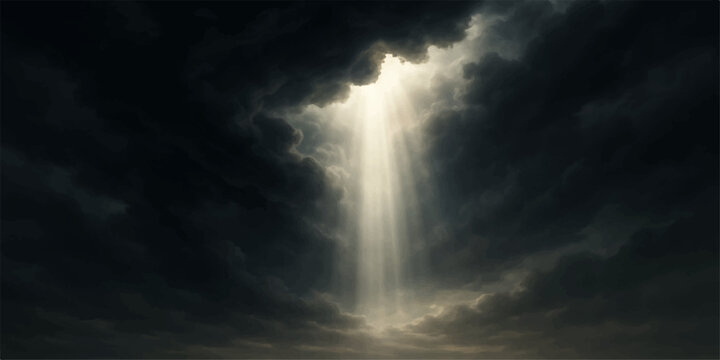 Dramatic dark storm clouds part to reveal bright sun rays in the blue sky