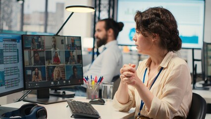 Woman engaging in discussion on video call to share finance strategy details, using data analysis to create a briefing for reports. Building an effective partnership via conferencing. Camera B.