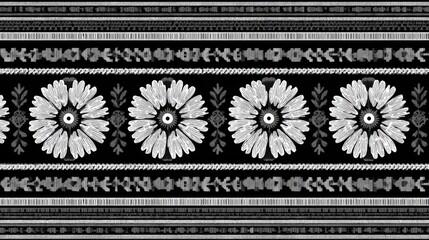 Black and white floral pattern with ethnic borders.