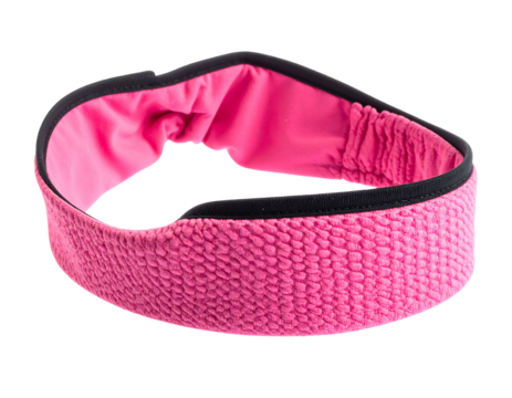 Bright pink elastic headband. Black trim frames textured fabric. Gathering visible on inner lining. Isolated on black background