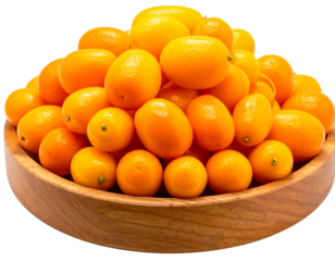Pile of shiny orange kumquats fills a light wooden bowl, ripe and ready to eat
