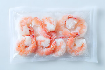 Fresh Frozen Shrimp in Vacuum Sealed Package on White Background Ready for Culinary Preparation