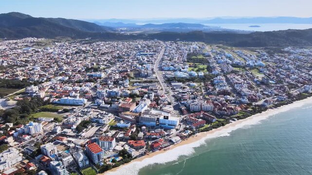Panoramic aerial view of Ingleses beach in Florian&oacute;polis, Santa Catarina, an urban complex on the coast, city master plan, neighborhoods and real estate developments facing the sea.
