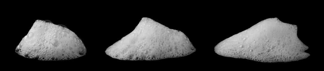 White soap foam bubbles isolated on black background, perfect for cleaning, hygiene, or freshness concepts. High-quality foam texture for detergent, skincare, and bathroom design visuals.