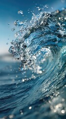 Cresting wave bursts, sea spray glittering in sunlight