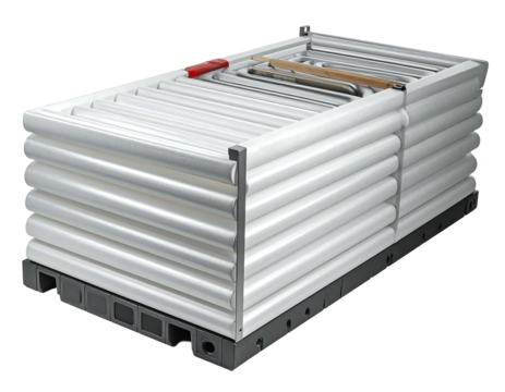 Stacked rectangular white objects sit atop a dark base, with metal bars and some red tools visible