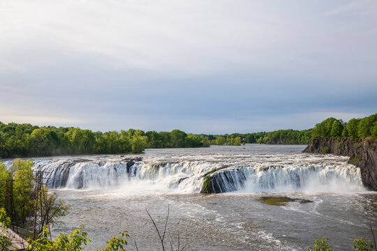 Cohoes Falls is a 1000-foot wide waterfall on the Mohawk River shared by the city of Cohoes and the town of Waterford, New York.