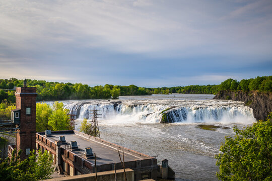 Cohoes Falls is a 1000-foot wide waterfall on the Mohawk River shared by the city of Cohoes and the town of Waterford, New York.