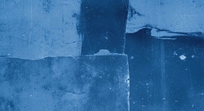 Grungy blue distressed concrete surface with subtle scratches and textures creating an abstract grunge background for design.