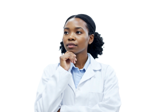 Thoughtful young black woman in a white coat, looking up. Black background isolates the focused figure
