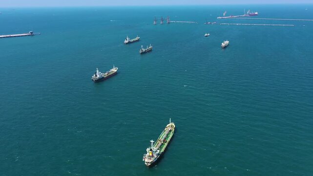 Aerial top view of Oil/Chemical LPG tanker ship Oversea transportation, Import-Export Business. Aerial view of oil and gas petrochemical tanker, Refinery industry cargo ship. Fuel for transport.