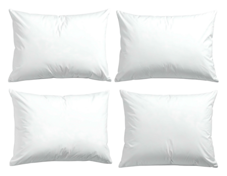 Four square, white pillows arranged against a stark black background, creating a clean, minimalist aesthetic