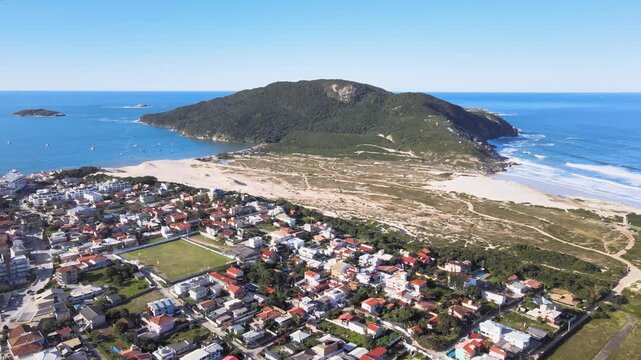 Panoramic aerial view of Santinho and Ingleses beach in Florian&oacute;polis, Santa Catarina, urban complex on the coast, city master plan, neighborhoods and restinga area.
