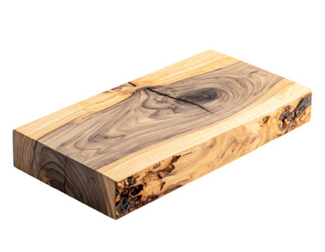 Polished wooden cutting board with swirling grain pattern, rough bark edge, isolated on a black background
