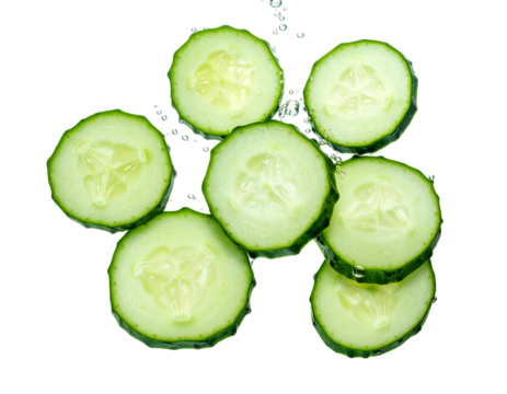 Fresh, green cucumber slices surrounded by clear water droplets against a pure black background