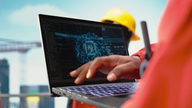 Close up of offshore platform worker using AI on laptop to refine operational efficiency. Engineer using artificial intelligence deep learning to monitor drilling rig production activities, camera A