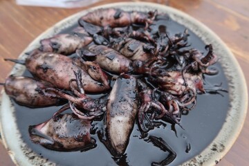 Squid stir-fried in black sauce, a popular Thai dish