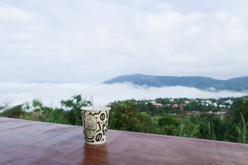 a cup of coffee on the table