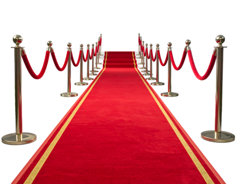 Red carpet flanked by gold stanchions with red velvet ropes on a black background for a glamorous event entrance