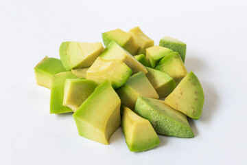 diced avocado on a white background, Avocado slices