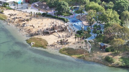 Urban Lakeside Recreational Area with Waterfront Facilities and Crowd Activities