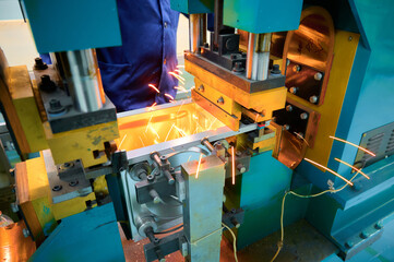 Spot welding process utilized in manufacturing microwave oven casings at a factory