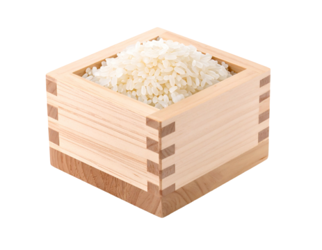 Rice overflowing from a light wooden square box with dovetail joints on a white background, angled high viewpoint