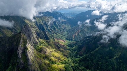Fototapeta premium Majestic Aerial View of Lush Green Mountains Surrounded by Dramatic Clouds and Scenic Valleys in a Breathtaking Landscape