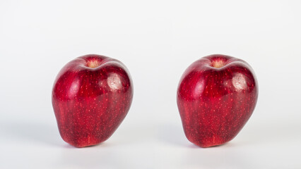 Red apple in hand white background