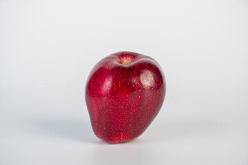Red apple in hand white background