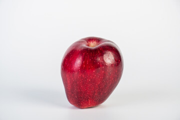 Red apple in hand white background