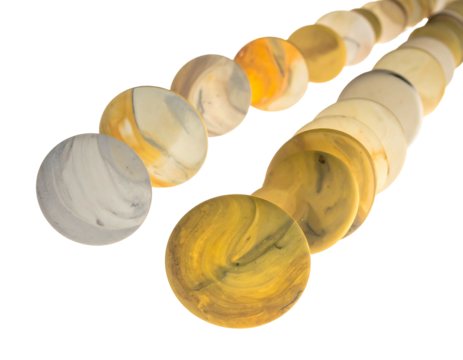 Rows of marble-like orbs fading to gold with swirling patterns, staggered on a black surface, creating depth