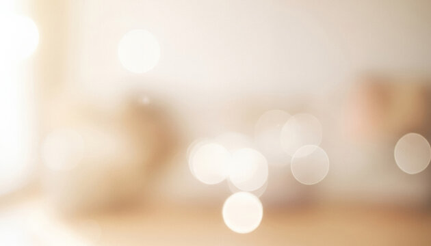 A gentle soft focus background illuminated by warm golden light, featuring delicate circular bokeh patterns that create a dreamy and tranquil visual atmosphere.