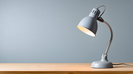 a stylish desk lamp illuminates a workspace, providing focused light and a sense of productivity. The desk is clean with a simple, modern design. The environment is comfortable